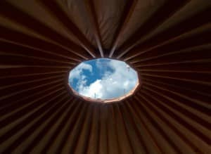 377364_10150496502423000_749202999_10585796_1956165968_n View of the sky through a yurt dome and radial rafters