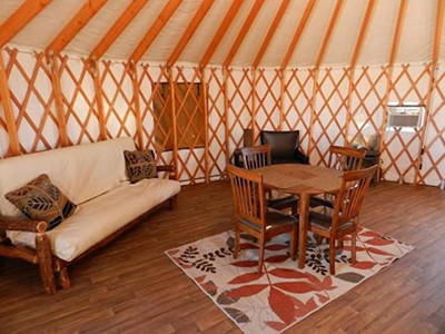 Dining table and sofa inside a yurt