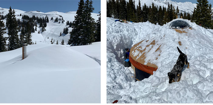 Yurt surrounded by deep mountain snow