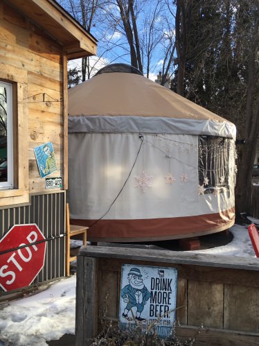 Small yurt outside a brewery