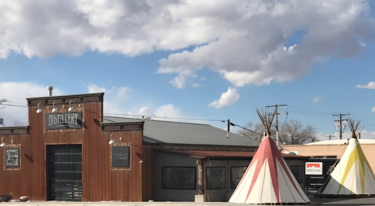 Painted tipis outside the Secret Creek facility