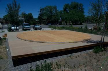 Circular wooden platform before yurt assembly
