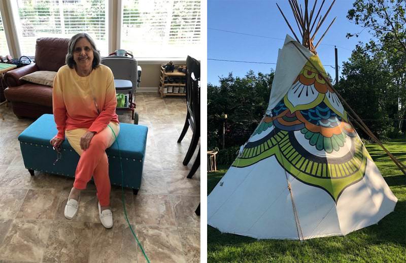 Tipi owner and painted tipi exterior