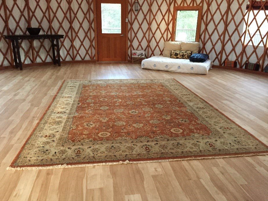 Finished wooden floor inside a yurt