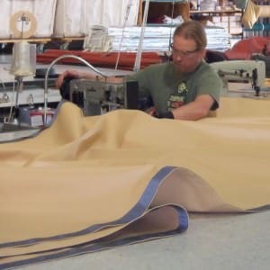 welder Worker preparing fabric in the Secret Creek workshop